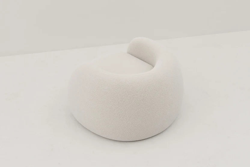 The Dori Boucle Curved Lounge Chair