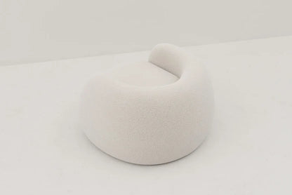 The Dori Boucle Curved Lounge Chair